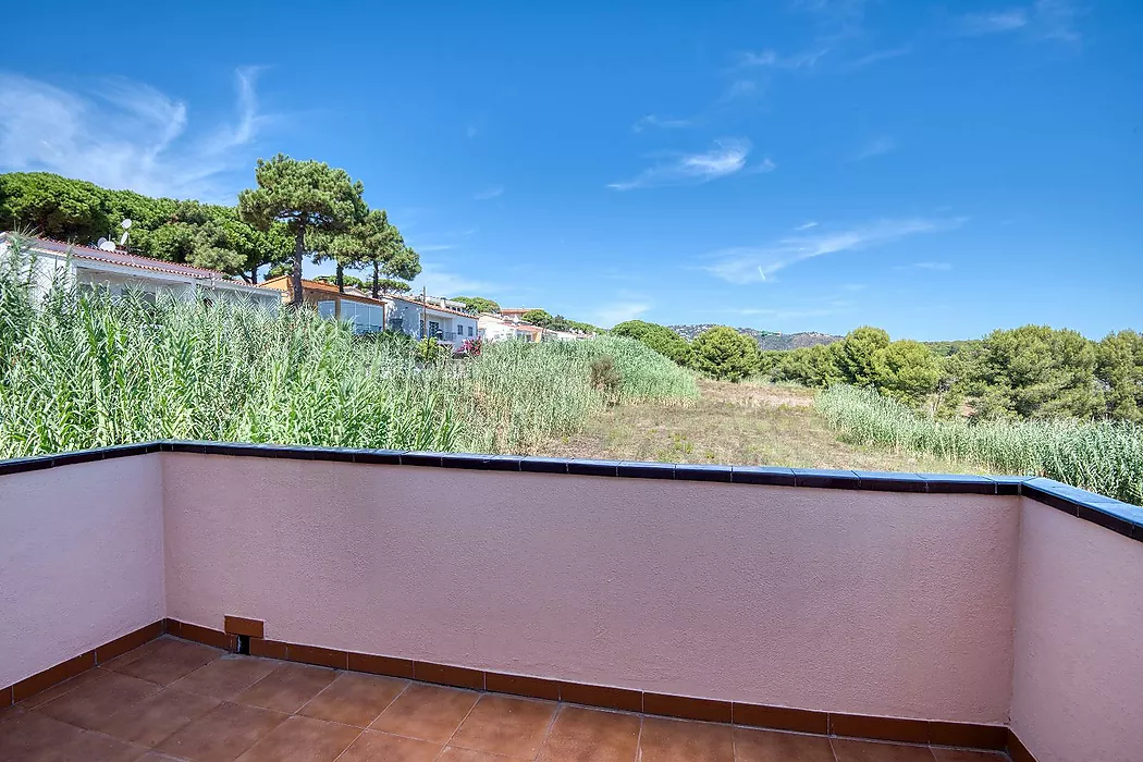 Apialia Costa Brava Exclusive. 131 m  townhouse for sale in a privileged area of S Agaró, featuring 3 double bedrooms, 2 full bathrooms, a private gar